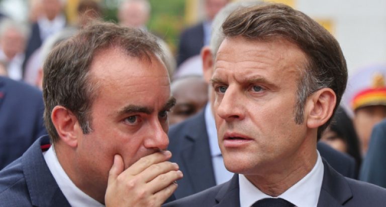 Frances-President-Emmanuel-Macron-R-speaks-with-Frances-Minister-of-Armed-Forces-Sebastien-Lecornu-768x413