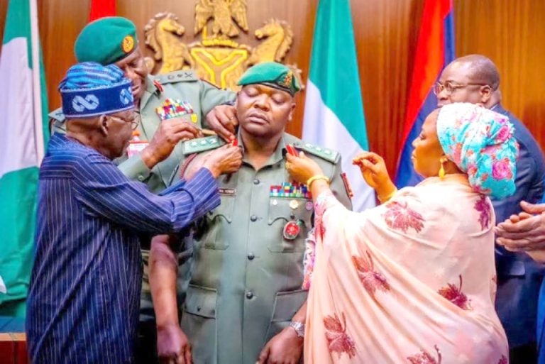 President-Bola-Ahmed-Tinubu-left-assisted-by-others-decorating-his-ADC-Nurudeen-Yusuf-with-rank-of-Colonel-at-the-Presidential-Villa-Abuja-in-January-2025