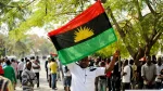 A-supporter-of-Indigenous-People-of-Biafra-IPOB-leader-Nnamdi-Kanu-holds-a-Biafra-flag-during-a-rally-in-support-of-Kanu-1536x864-1-1